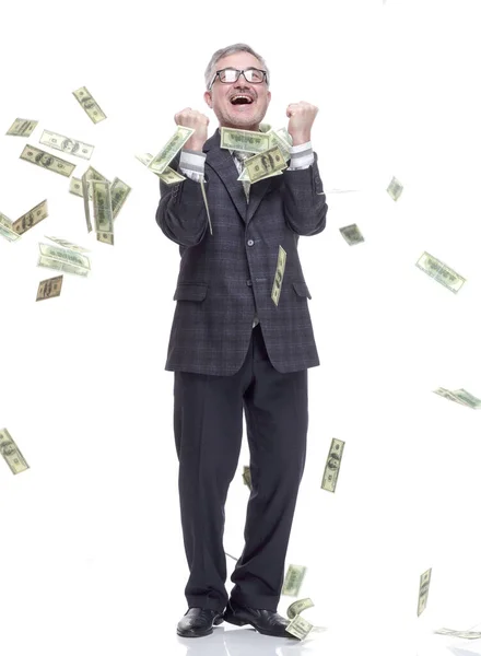Šťastný muž stojící v dešti peněz. izolované na bílém — Stock fotografie