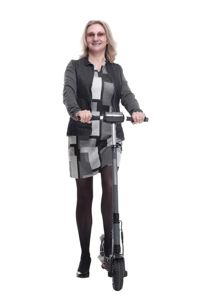 Smiling young woman with an electric scooter. isolated on a white — Stock Photo, Image