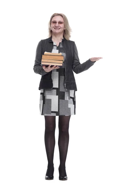 Souriant jeune femme avec une pile de livres — Photo