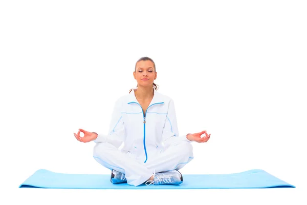 A lotus position in practise of yoga - on white background — Stock Photo, Image