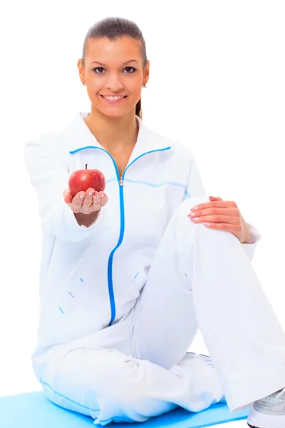 Fitness woman happy smiling holding apple — Stock Photo, Image