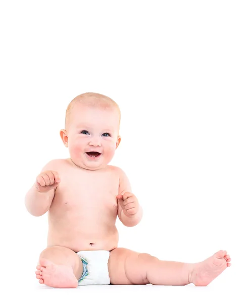 Baby sitzt auf dem Boden, isoliert auf weiß — Stockfoto