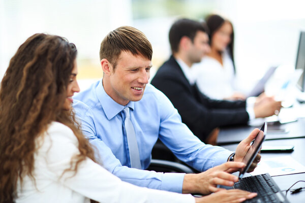 Businessman and businesswoman meeting In modern office