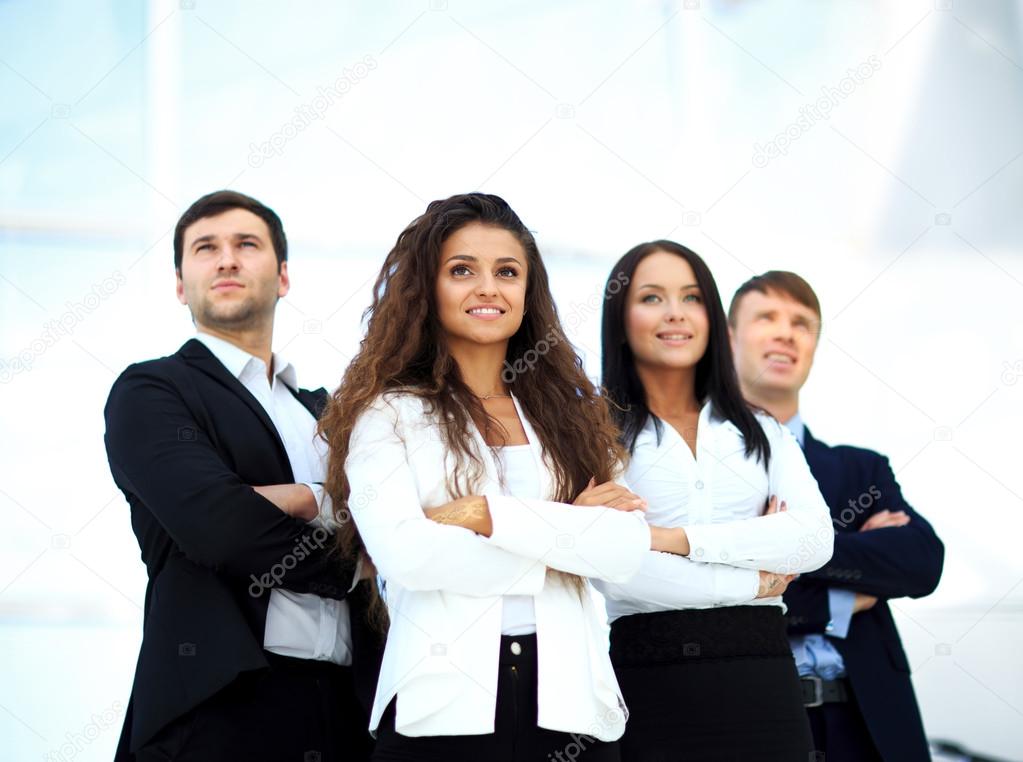 Young smiling businesswoman looking confident while being follow