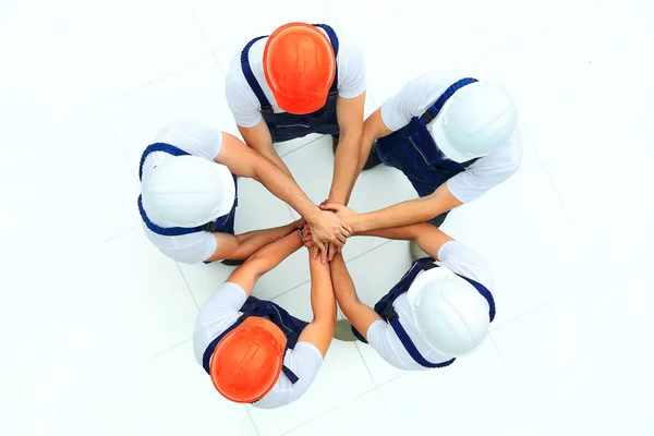 Large group of workers standing in circle — Stock Photo, Image