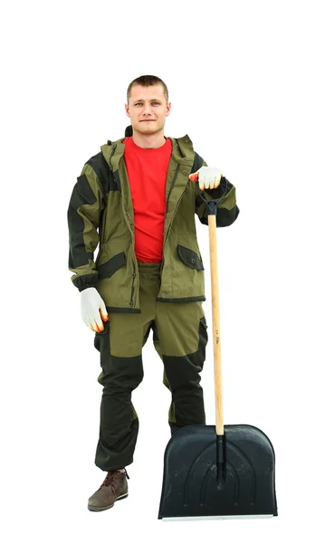 Retrato de comprimento total de um limpador em um uniforme com uma vassoura isolado fundo branco — Fotografia de Stock