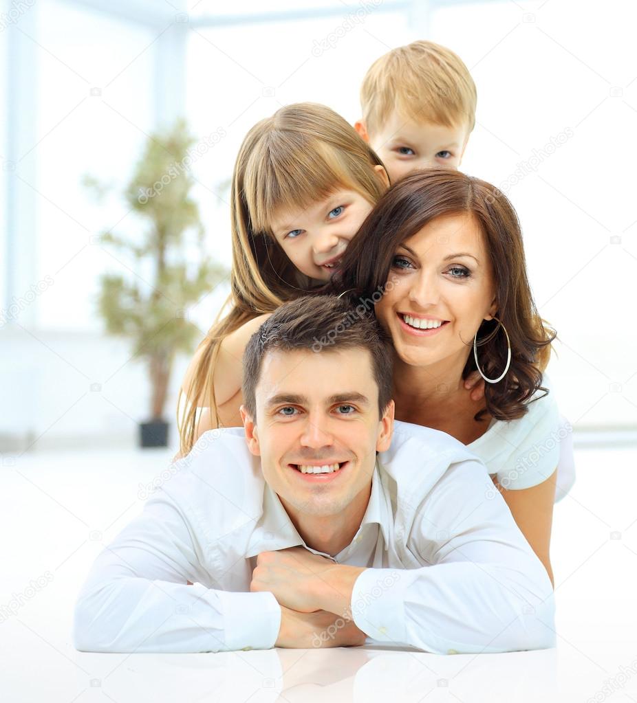 The pyramide of the smiling happy family