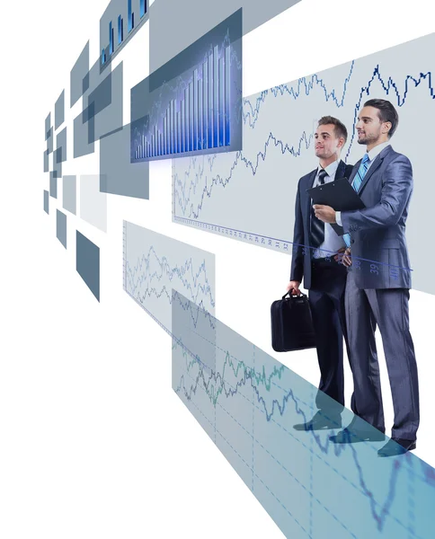 Två affärsmän tittar på lysande diagram — Stockfoto