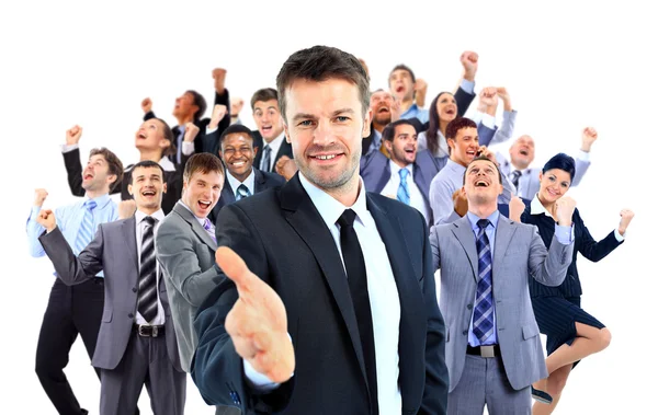 Happy business group. leader with open hand and ready to shake your hand — Stock Photo, Image