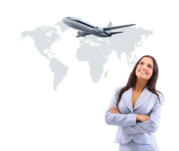 Business woman smileeng and looking at airplane — Stock Photo, Image