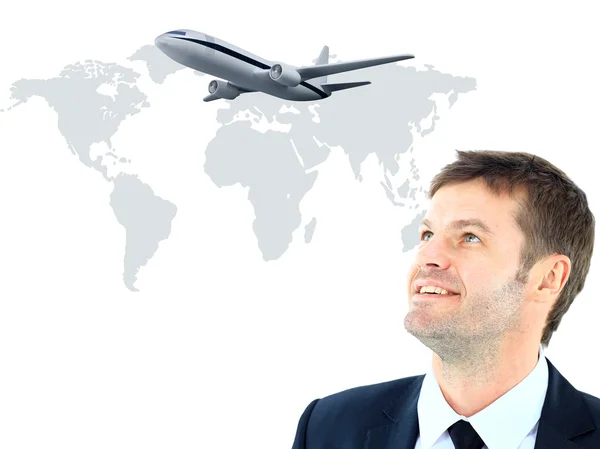 Empresário smileeng e olhando para o avião — Fotografia de Stock