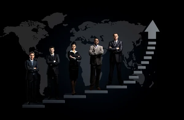 Επιχειρηματική ομάδα στέκεται σε ένα γράφημα — Φωτογραφία Αρχείου