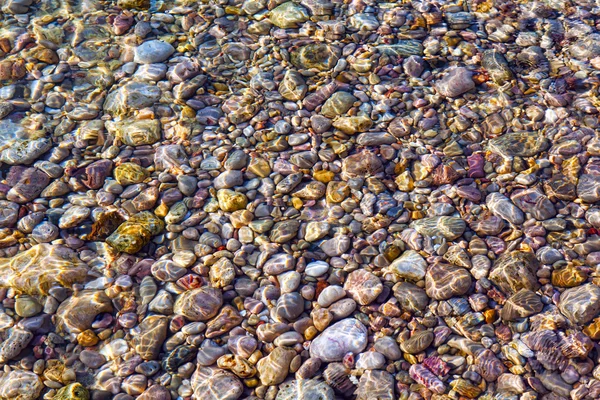 Pebbly beach background from Paphos, Cyprus. Shingle beach — Stock Photo, Image