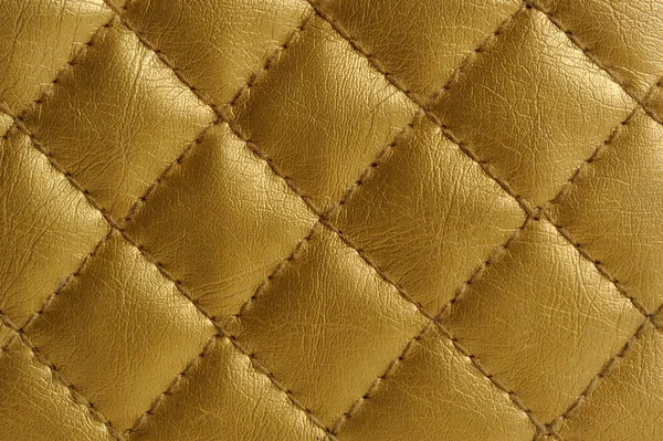 Золотое стеганое одеяло — стоковое фото