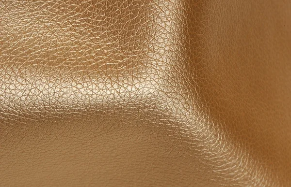金色的光泽人工皮革背景纹理 — 图库照片