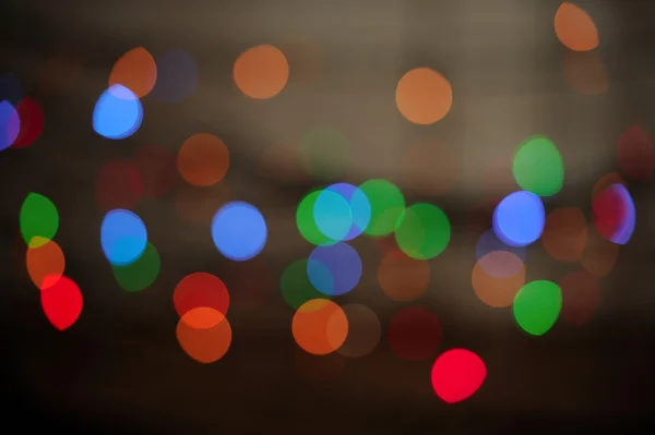 Mehrfarbige glühende Bokeh Lichter Hintergrund — Stockfoto