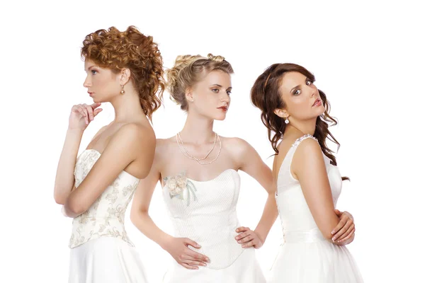 婚礼礼服孤立 ov 三个美丽的女人的画像 — 图库照片