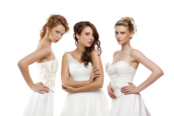 Portrait of a three beautiful woman in wedding dress isolated ov — Stock Photo, Image