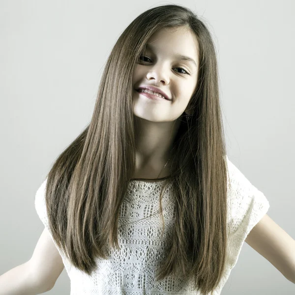 Portrait of a charming brunette little girl — Stock Photo, Image