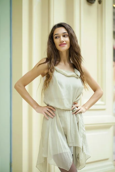 Portrait close up of young beautiful brunette woman in beige dre — Stock Photo, Image