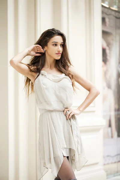 Portrait close up of young beautiful brunette woman in beige dre — Stock Photo, Image