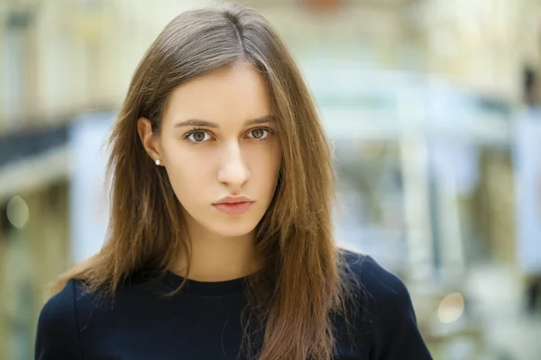 Close up of young beautiful woman in black dress — Stock Photo, Image