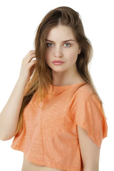 Mooie blonde vrouw mannequin in oranje blouse — Stockfoto
