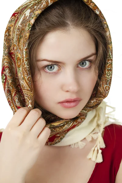 Young blonde woman in a red golden scarf — Stock Photo, Image