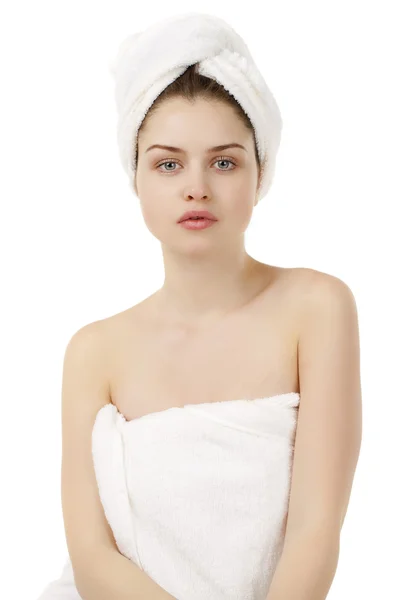 Beautiful young woman posing in white towel — Stock Photo, Image