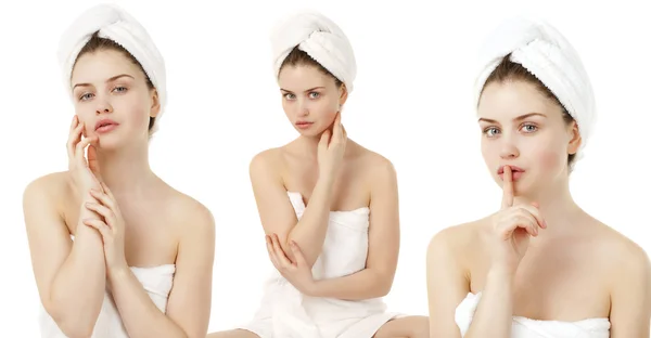 Beautiful young woman posing in white towel — Stock Photo, Image