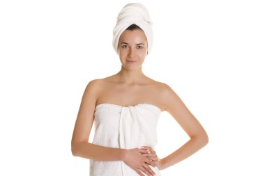 güzel bir genç kadın beyaz havlu poz