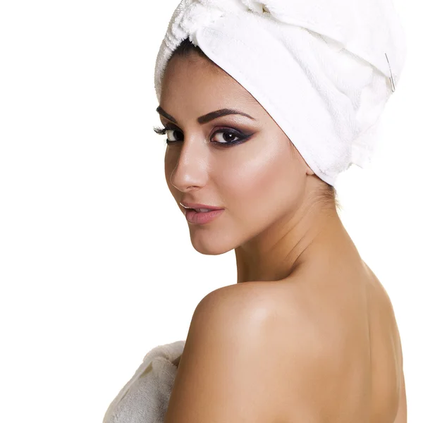 Beautiful young ethnic woman in white towel — Stock Photo, Image