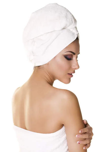 Beautiful young ethnic woman in white towel — Stock Photo, Image