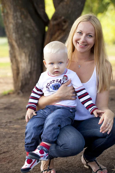 Mother with two year old son in  summer park — Stock Photo, Image