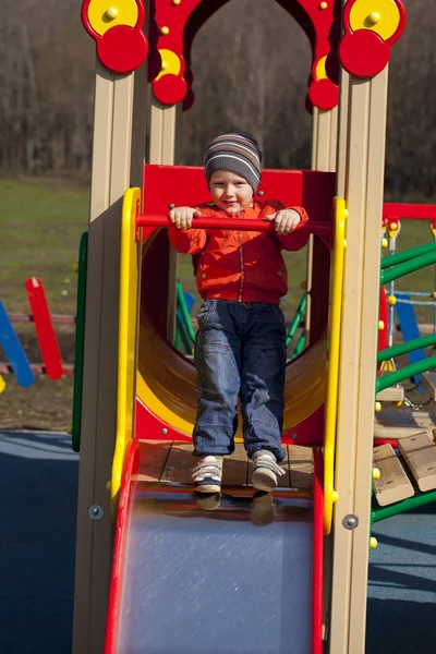 The three-year young boy on the playground — Stock Photo, Image