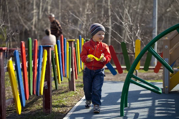 The three-year young boy on the playground — Stock Photo, Image