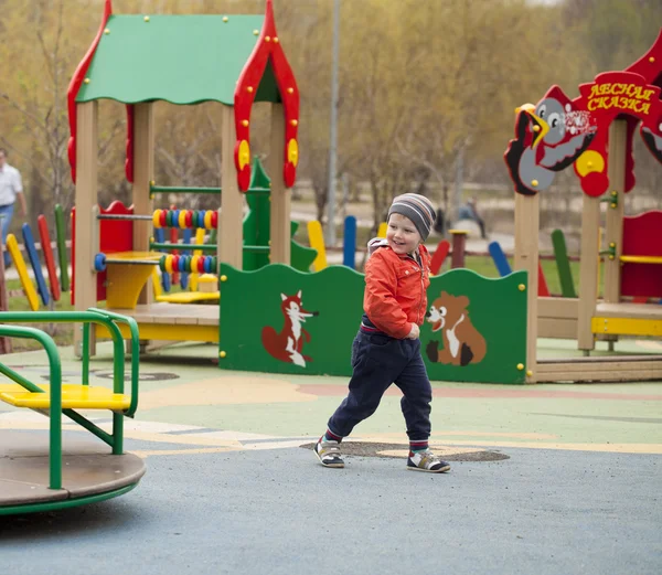 The three-year young boy on the playground — Stock Photo, Image