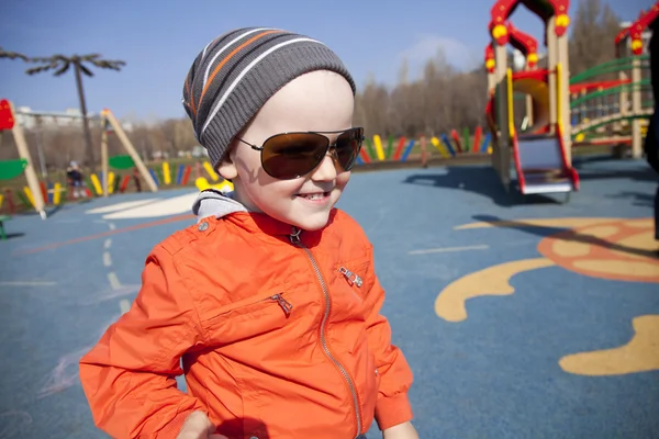 The three-year young boy on the playground — Stock Photo, Image