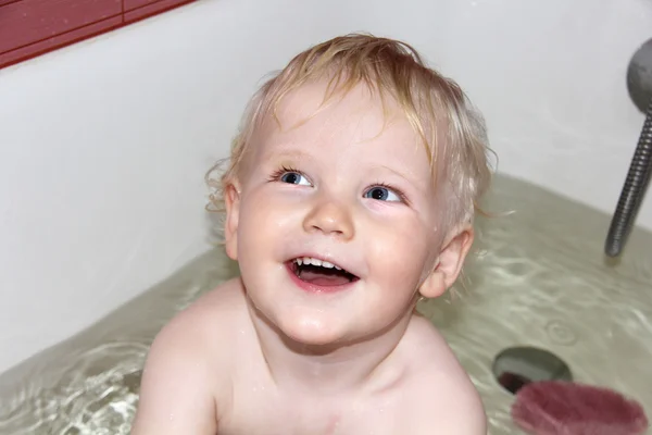 Curly wavy hair blond baby boy — Stock Photo, Image