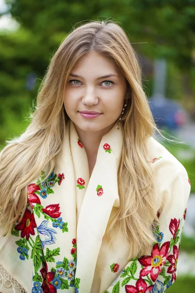 Russian woman in the national patterned scarf — Stock Photo, Image