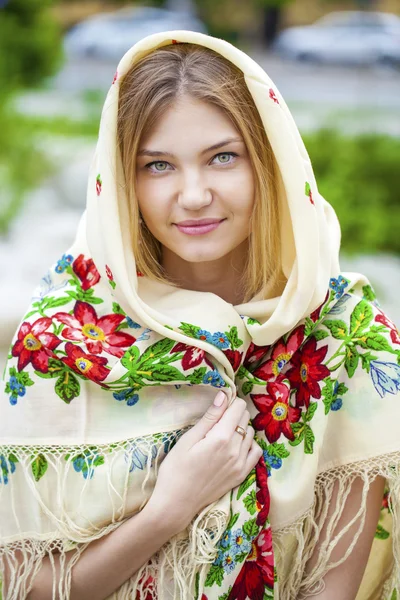 Russian woman in the national patterned scarf — Stock Photo, Image