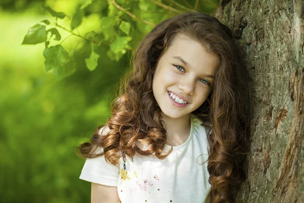 Portrait of a beautiful young little girl — Stock Photo, Image