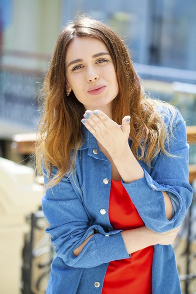 Blow kiss, young caucasian brunette woman — Stock Photo, Image