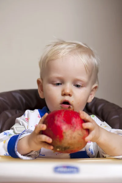 Two year baby boy sitting at the dinner table — Stock Photo, Image