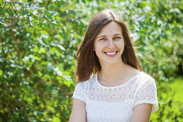 Portrait of beautiful young happy woman 