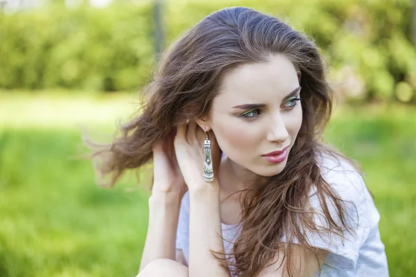 Portrait close up of young beautiful brunette woman — Stock Photo, Image