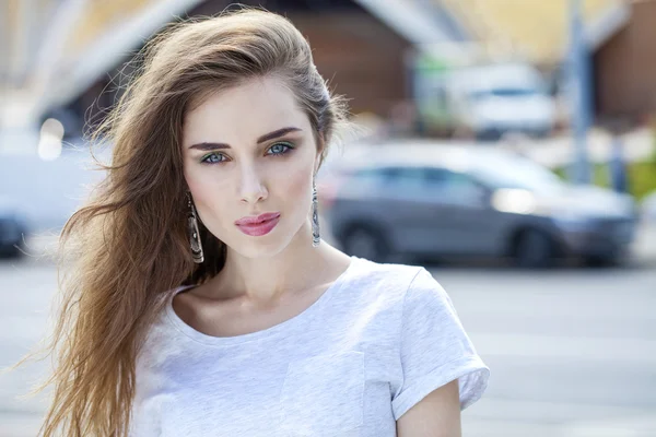 Portrait close up of young beautiful brunette woman — Stock Photo, Image