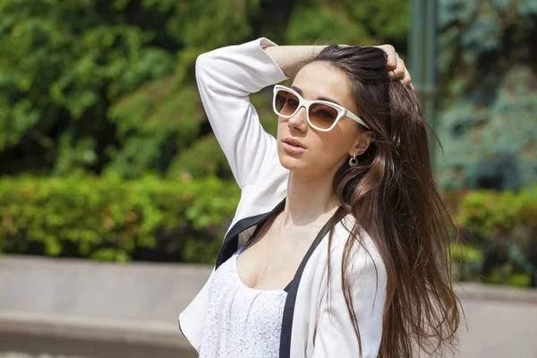 Portrait close up of young beautiful brunette woman — Stock Photo, Image