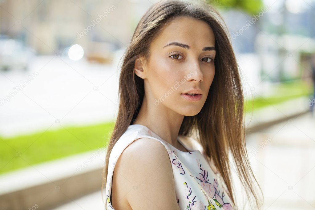 Portrait of beautiful young happy woman 