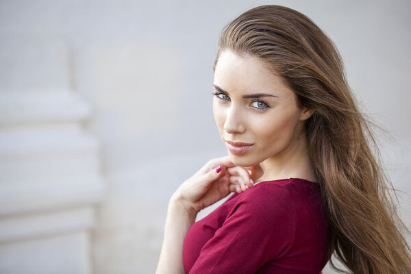 Portrait close up of young beautiful brunette woman